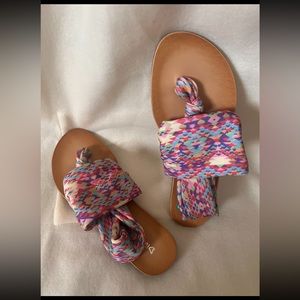 Sandals with soft pastel colors